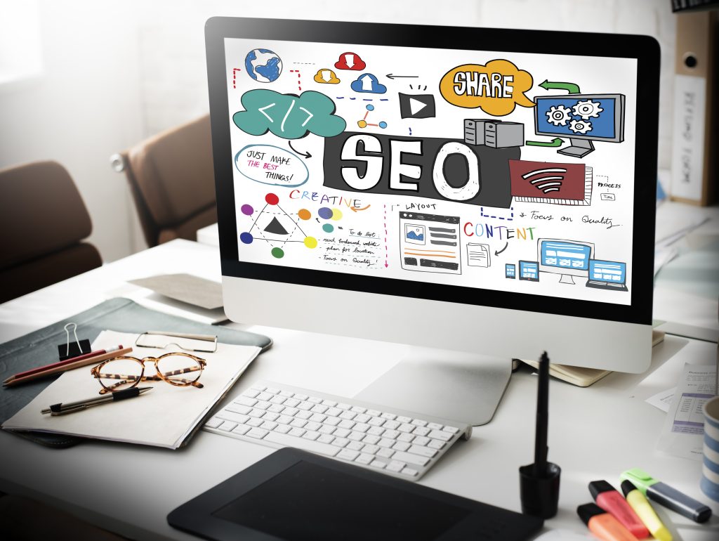 Business owners discussing SEO Services in Sandton and Midrand to improve local search visibility and attract more customers.